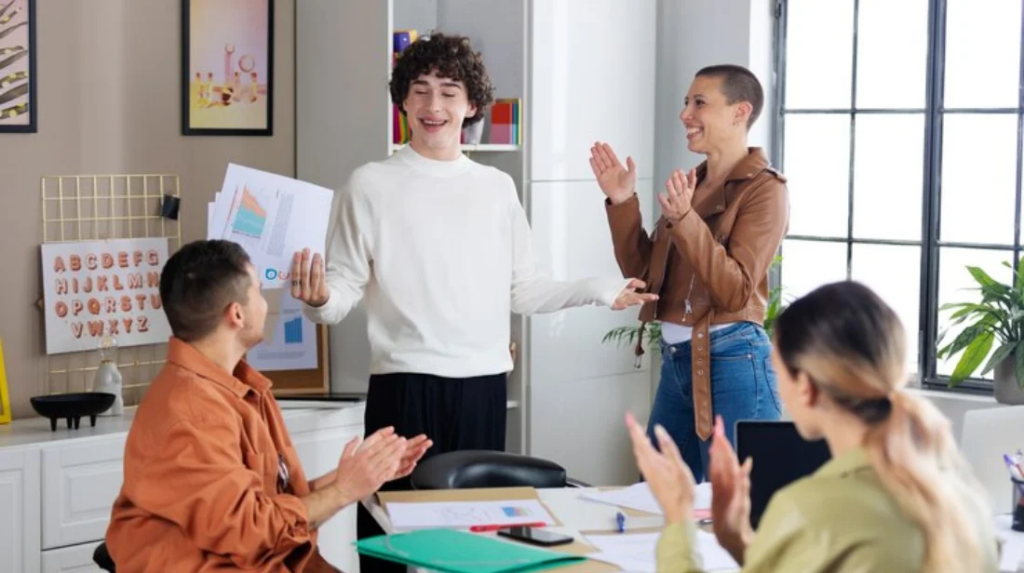 a group of people clapping